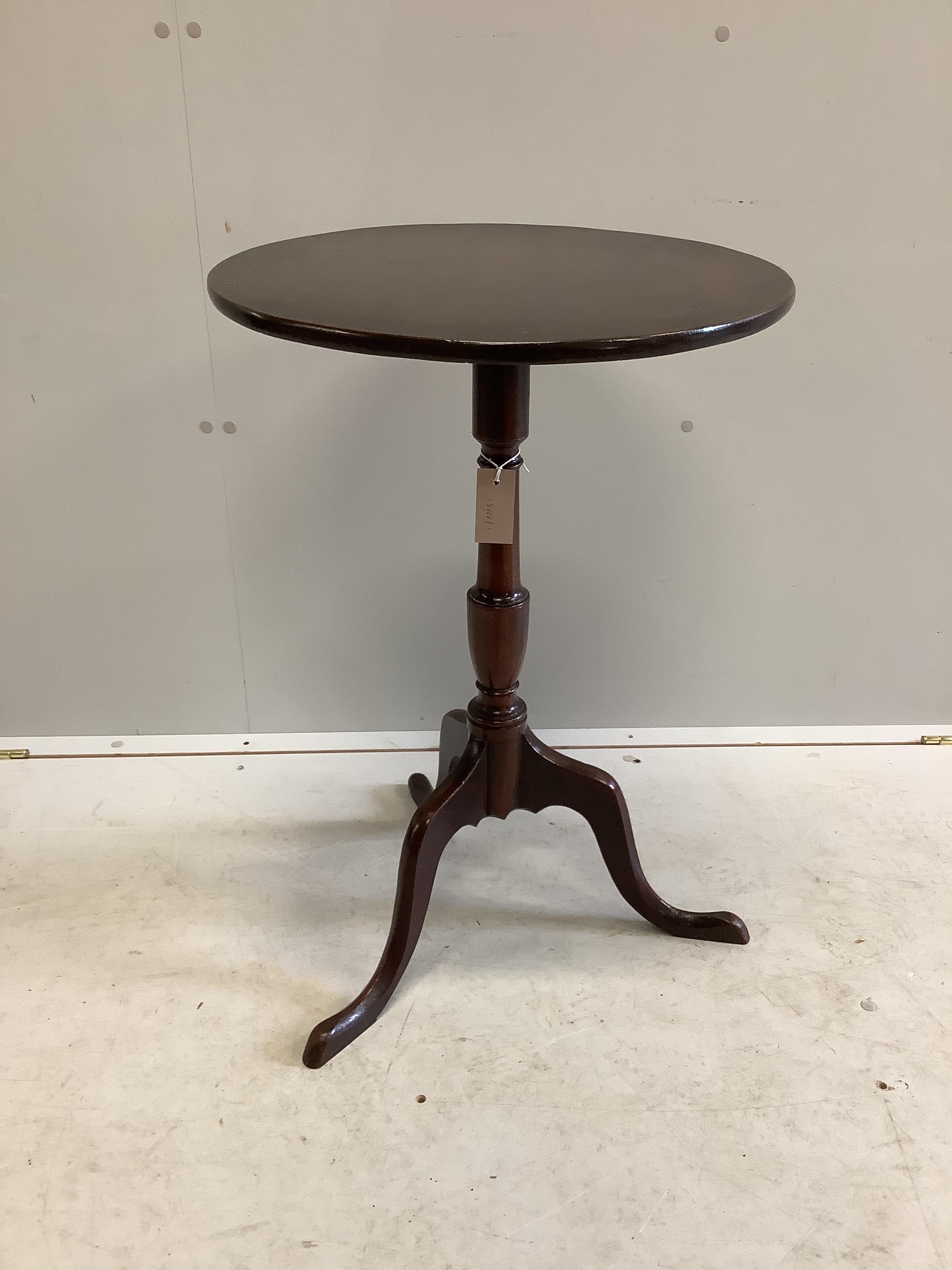 A George III circular mahogany tilt top tripod wine table, diameter 48cm, height 71cm